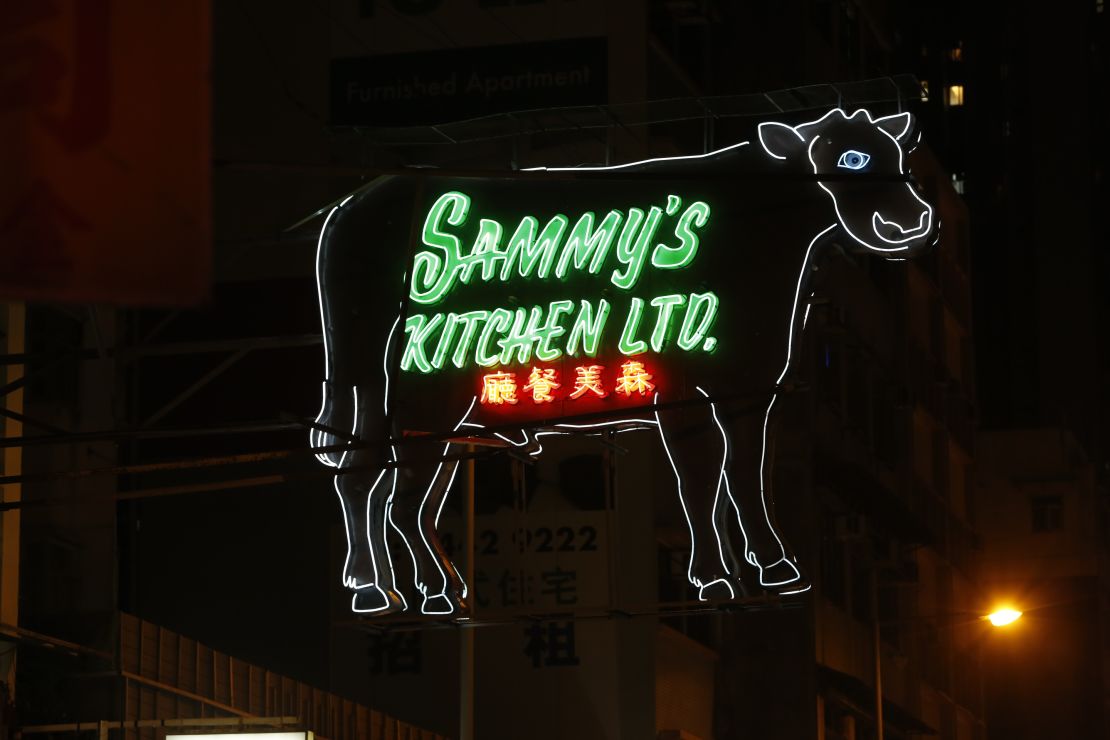 Restaurant owners were told to remove their neon cow sign.