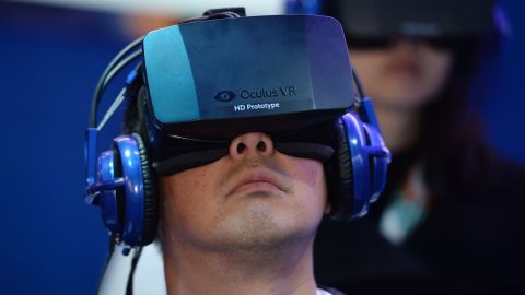 A gamer wearing an Oculus virtual-reality headset.  