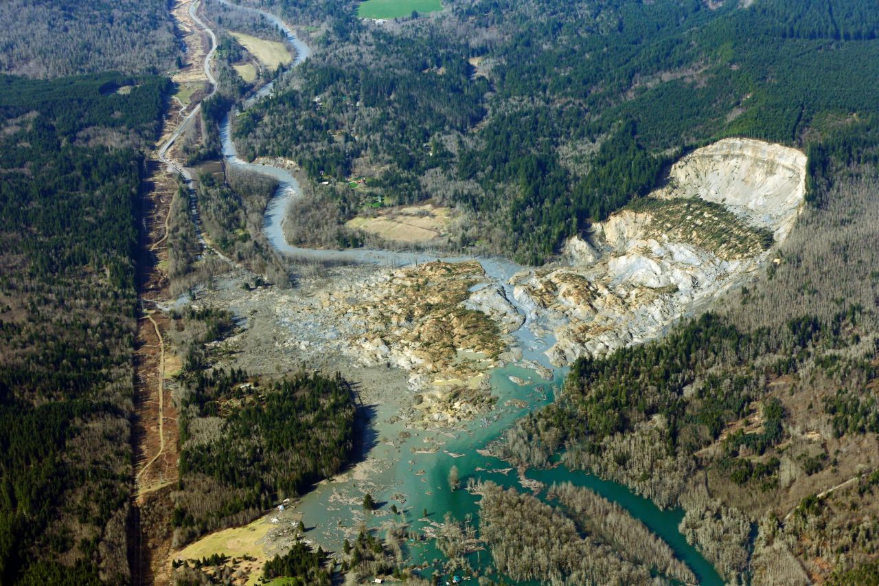 The remains of the massive landslide are seen on Monday, March 24. The landslide blocked the highway and the Stillaguamish River.