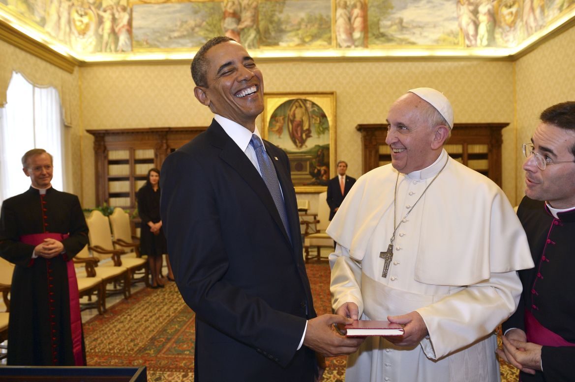 U.S. President Barack Obama exchanges gifts with Pope Francis after meeting him at the Vatican on Thursday, March 27. It was the <a href="http://www.cnn.com/2014/03/27/politics/gallery/obama-meets-pope-francis/index.html">first-ever meeting</a> between the two, and it had its share of light moments.