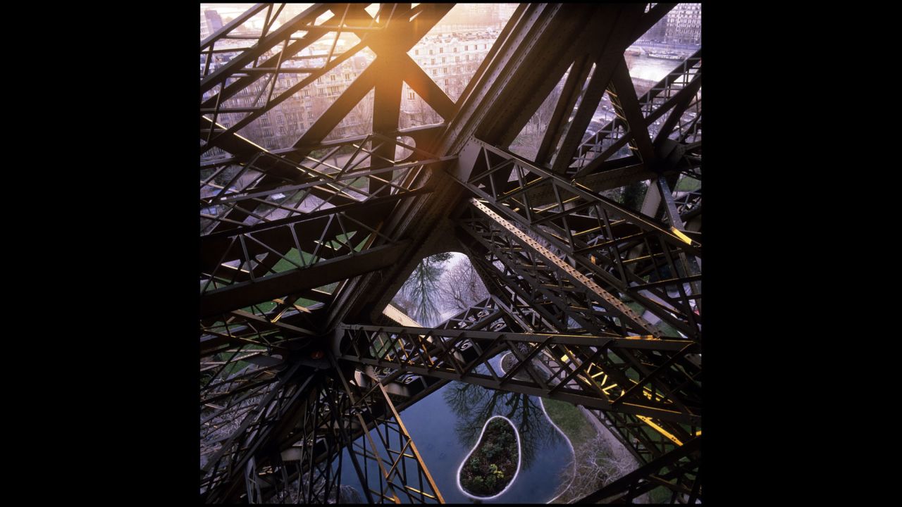 The sun shines through the tower's ironwork in 1987.