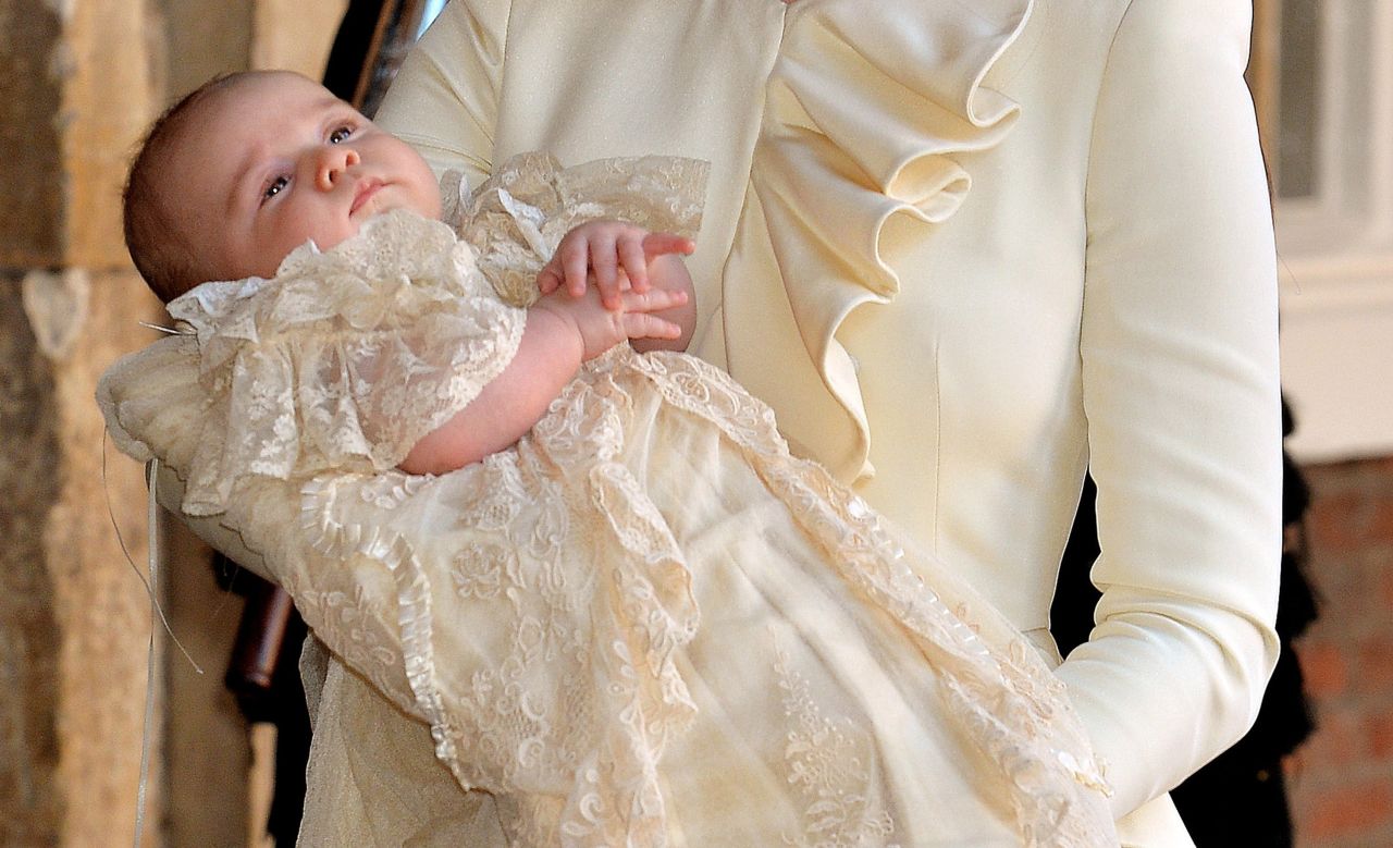 Catherine carries her son after his christening.