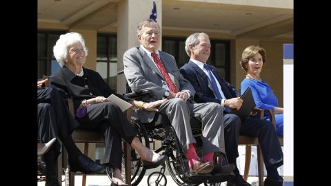 Former U.S. President George H.W. Bush (2nd L) wears pink socks as he attends the dedication ceremony for the George W. Bush Presidential Center in Dallas, April 25, 2013. Also pictured are former first lady Barbara Bush (L), former President George W. Bush (2nd R) and former first lady Laura Bush. REUTERS/Jason Reed (UNITED STATES - Tags: POLITICS) Reuters /JASON REED /LANDOV Photographers/Source: JASON REED/Reuters /Landov
