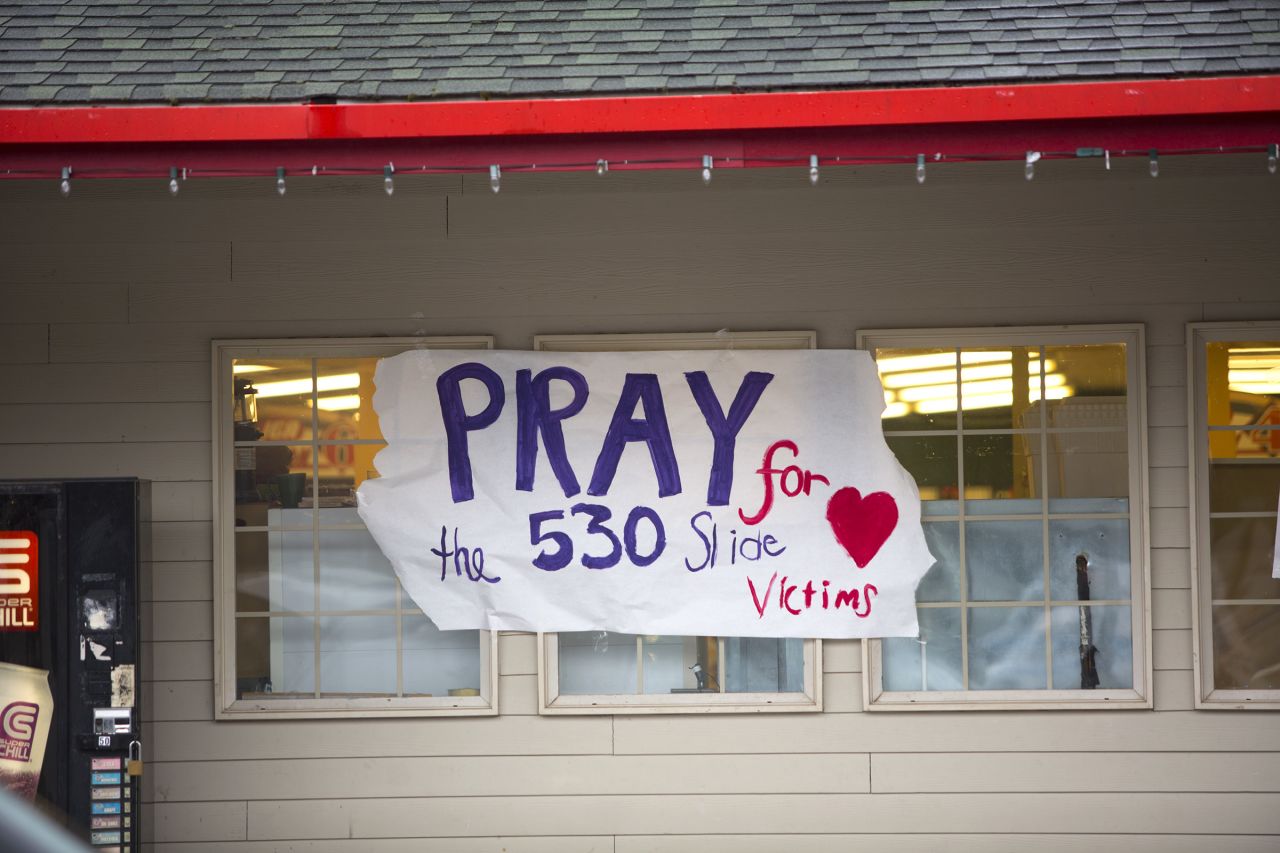 A sign in front of a Darrington supermarket expresses support for those affected by the landslide. There are dozens of signs like this in Darrington.