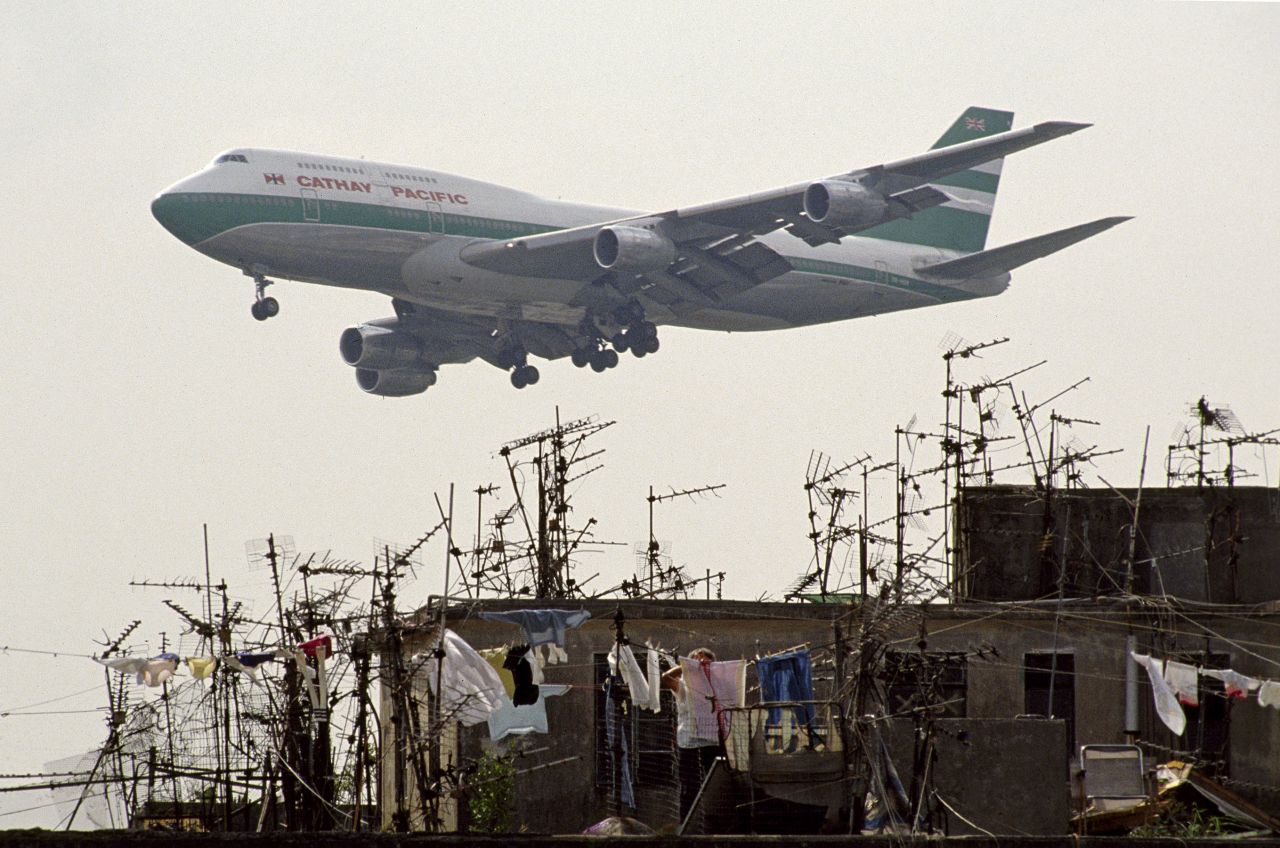 Planes landing at Hong Kong's nearby airport, Kai Tak, often roared overhead.