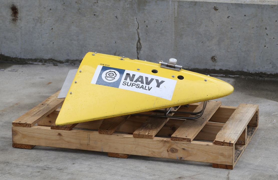 A sensor for the towed pinger locator sits on the wharf at a naval base in Perth, Australia, on Sunday, March 30.