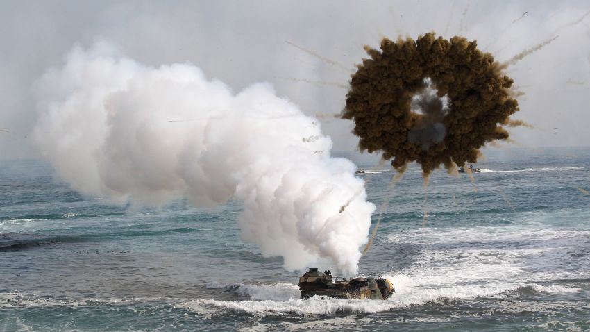 A South Korean marine LVT-7 landing craft sail to shores through a smoke screen during the U.S.-South Korea joint landing exercises called Ssangyong, part of the Foal Eagle military exercises, in Pohang, South Korea, Monday, March 31, 2014.  South Korea said North Korea has announced plans to conduct live-fire drills near the rivals' disputed western sea boundary. The planned drills Monday come after an increase in threatening rhetoric from Pyongyang and a series of rocket and ballistic missile launches in an apparent protest against the annual military exercises by Seoul and Washington.  (AP Photo/Ahn Young-joon)