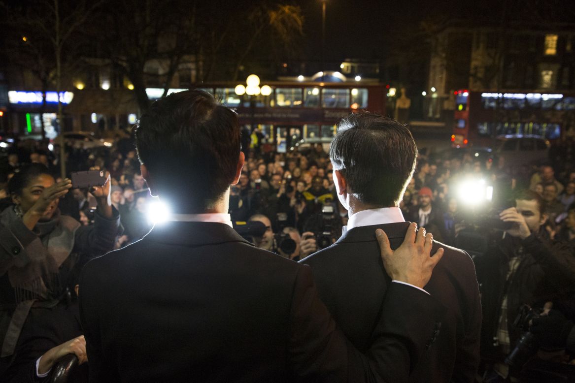 MARCH 31 - LONDON, UK: Gay couple Peter McGraith (right) and David Cabreza speak to the press after getting married shortly after midnight at Islington Town Hall at one of the UK's first same-sex weddings on March 29. <a href="http://www.cnn.com/2014/03/28/world/europe/uk-same-sex-marriage/"> England and Wales are among 15 countries</a> as well as parts of the United States and Mexico that allow gay marriage.