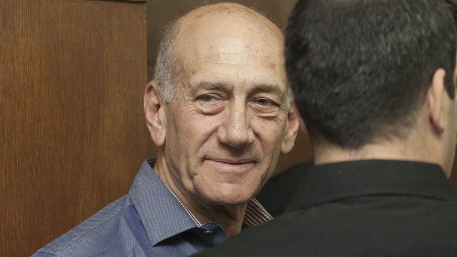 Former Israeli Prime Minister Ehud Olmert attends a hearing at Tel Aviv's District Court on Monday.