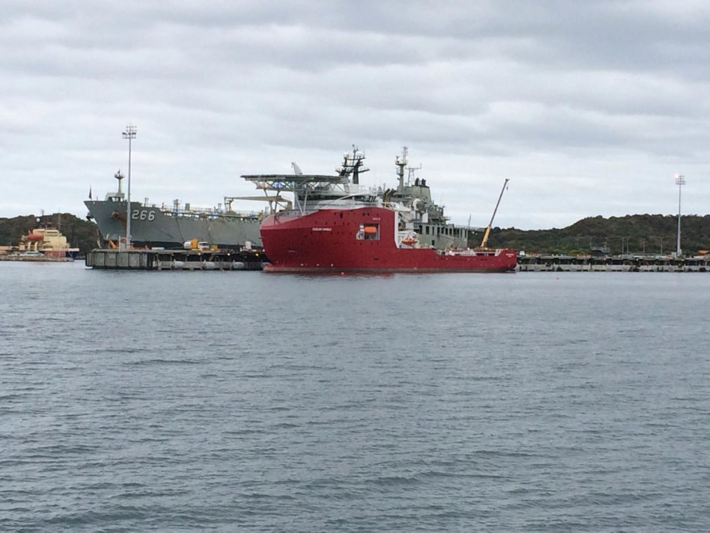 Australian Defense Vessel Ocean Shield prepares to sail for the search zone, with the pinger locator and underwater drone already on board.