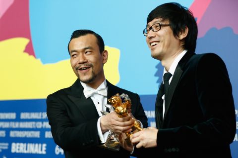 "We don't want to be liked just for being overtly political. We have our own understanding of film. We want to conquer you with beauty and with Eastern sensibilities," says director Diao Yinan (right). He received the Golden Bear at the 2014 Berlinale.