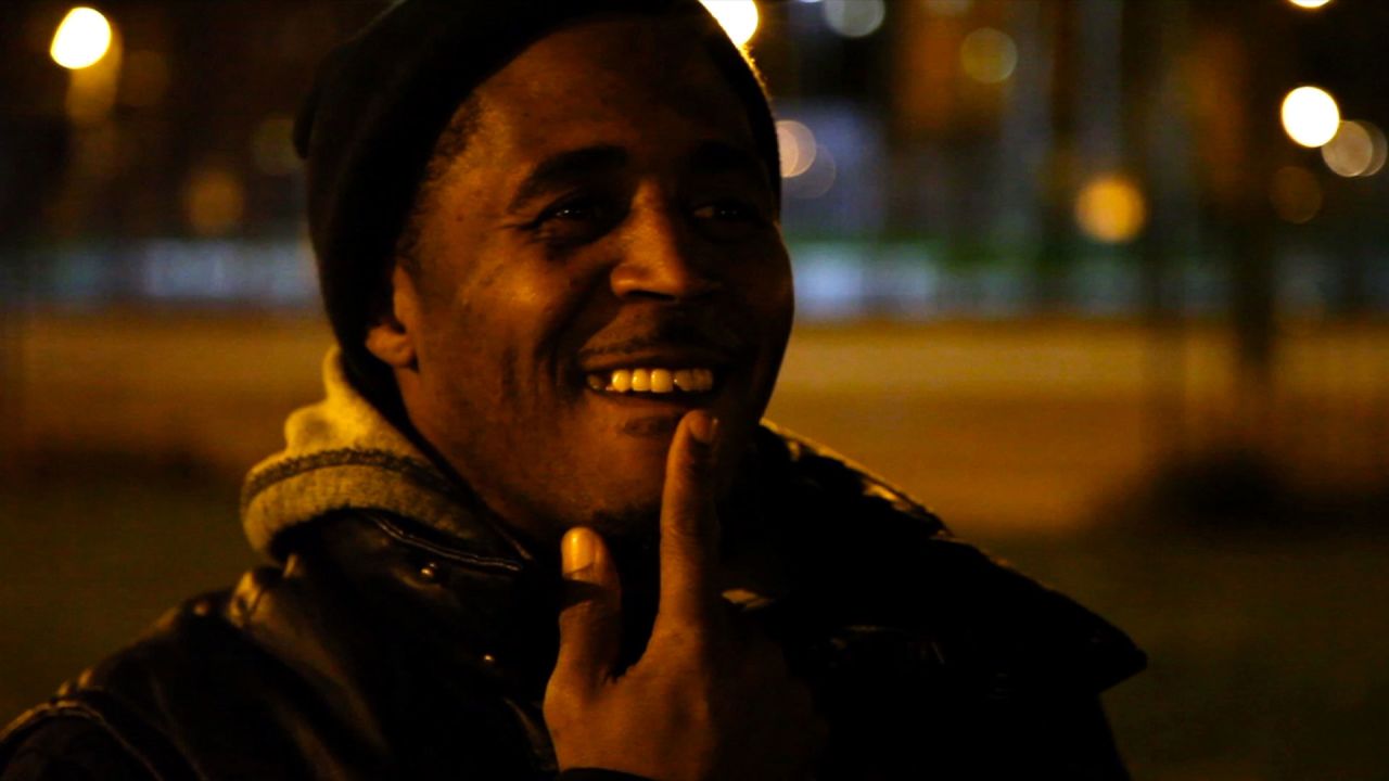 Williams shows his chipped tooth from running races with other kids inside Chicago's infamous Cabrini Green high rise.