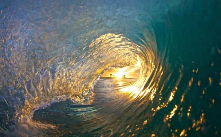 It took Croman six months to get what he calls "the Shot," taken at Sandy Beach. He woke up at 4:30 every morning to try and photograph the sun inside the barrel of a wave. 