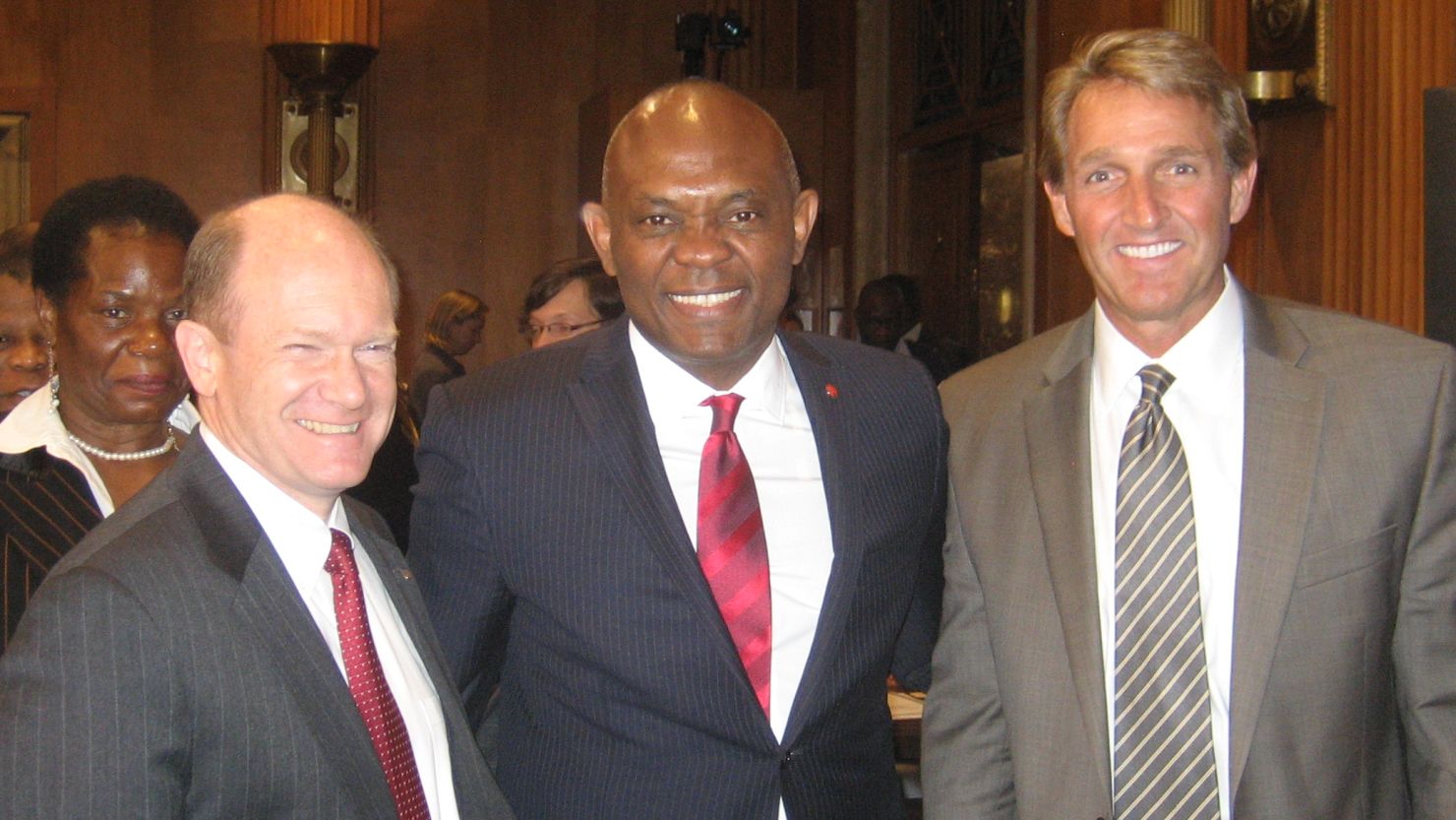 Tony O. Elumelu (center) with Senator Chris Coons (left) and Senator Jeff Flake on March 27.