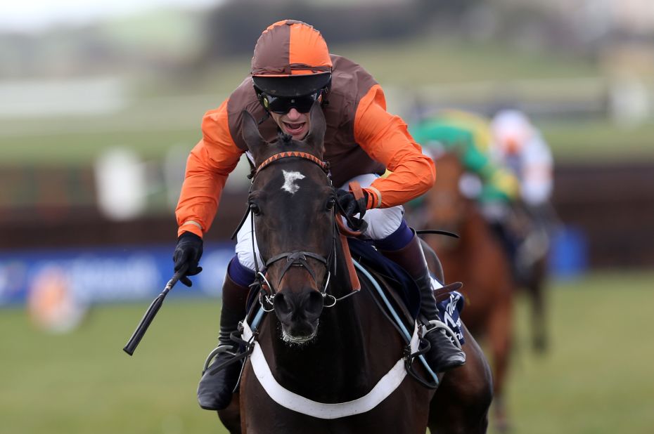 Waley-Cohen will be in the orange and brown colors of his father Robert when he takes to the start for the Britain's Grand National race.
