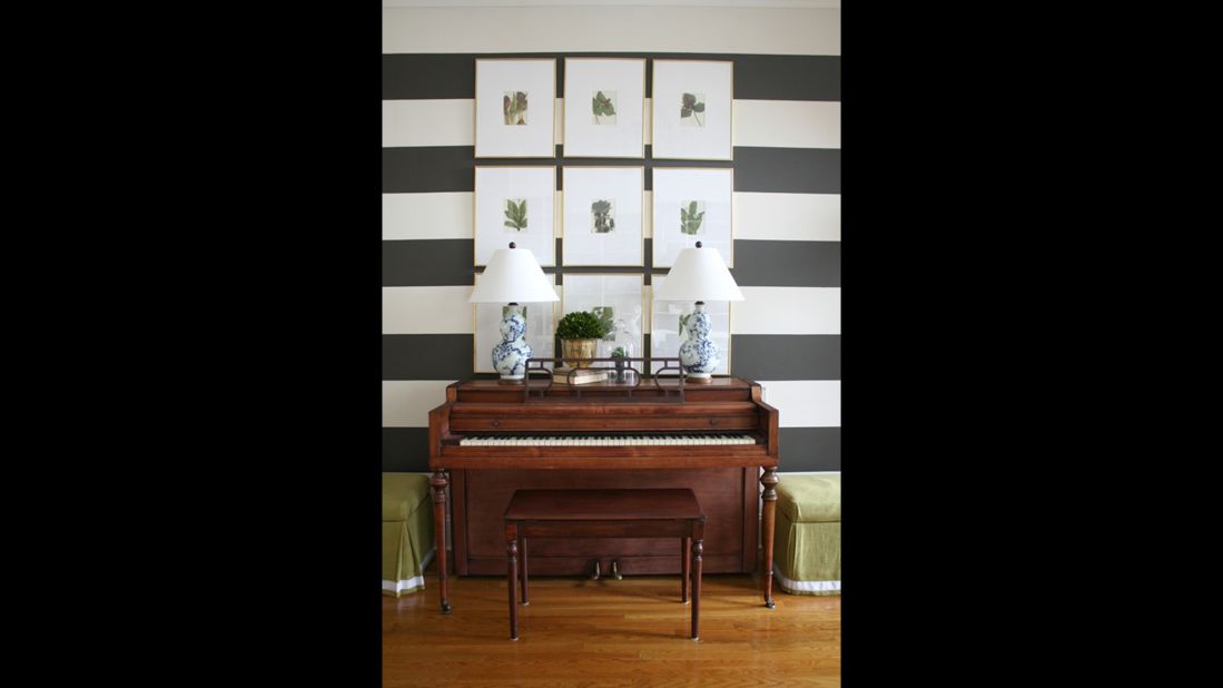 Clark's foyer boldly displays a black-and-white stripe paint treatment.