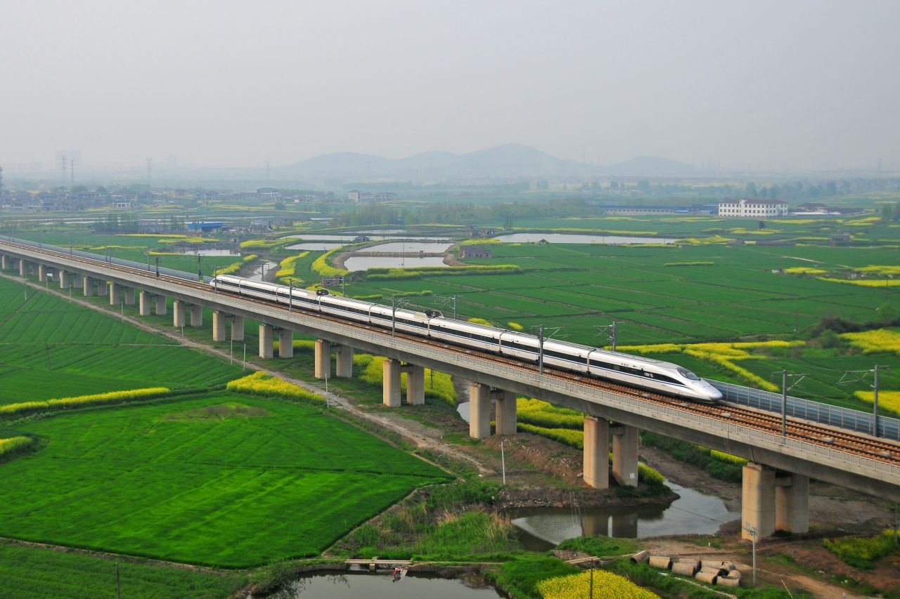 China takes the title for the longest rail bridge -- in fact the longest bridge of any kind -- with the 102 mile Danyang--Kunshan Grand Bridge. Opened in 2011, it connects Shanghai to Nanjing along the Beijing-Shanghai High-Speed Railway.