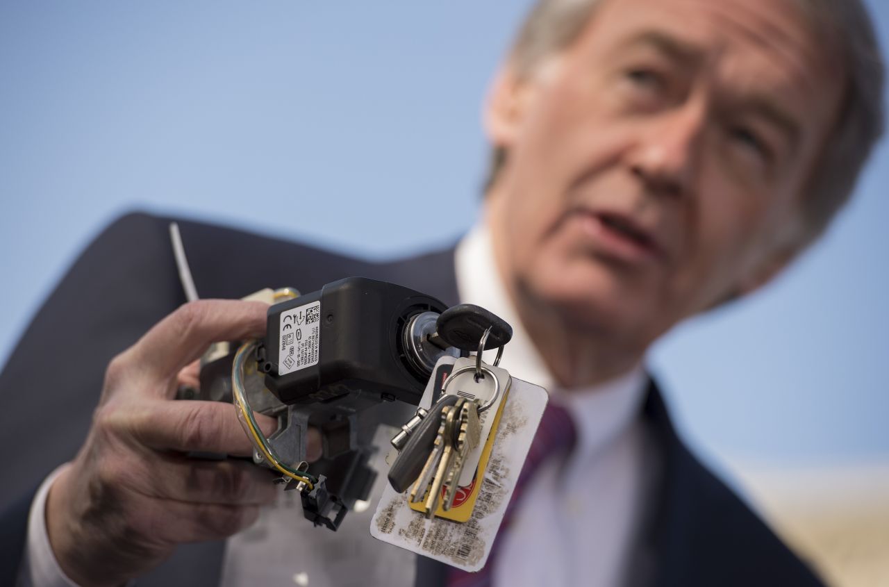 U.S. Sen. Edward Markey, D-Massachusetts, holds up a faulty GM ignition switch during the news conference, which was held in Washington before Barra spoke to the House subcommittee.