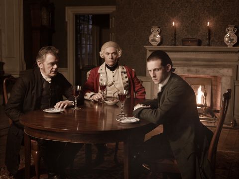 "Turn" dramatizes the story of America's first spy ring during the Revolutionary War. Jamie Bell, right, stars as Abe Woodhull, a farmer who helps form a team of secret agents aiding George Washington. The show has been renewed for a second season on AMC, airing in spring 2015.