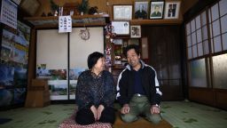 Toshio Koyama, 72, and his wife Kimiko, 69, who evacuated from the Miyakoji area of Tamura three years ago, smile after they returned to their home in Tamura, Fukushima prefecture April 1, 2014.