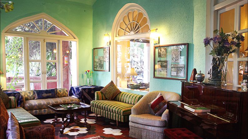 The main lounge at Ranjit's Svaasa, a 200-year-old heritage hotel in Amritsar, is decorated with antique pieces and art from the family's personal collection. 