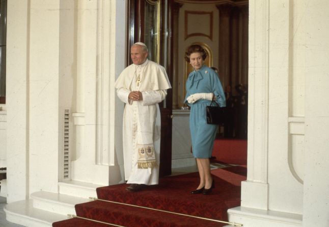 Pope John Paul II walks with the Queen at London's Buckingham Palace in May 1982.