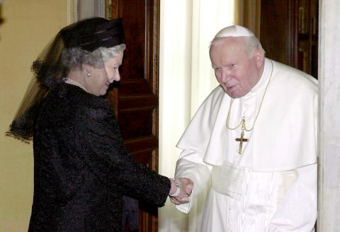 The Queen shakes hands with Pope John Paul II at the Pope's private office in October 2000.