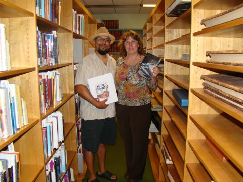 "I would like to see more cinema representation of the really good books done in a huge fashion," said Joan Kaywell, who maintains the <a href="http://www.lib.usf.edu/special-collections/childrens-young-adult-literature/hipple/" target="_blank" target="_blank">Hipple Collection of Young Adult Literature</a> at the University of South Florida. She is pictured here with author Greg Neri at the Hipple Collection.