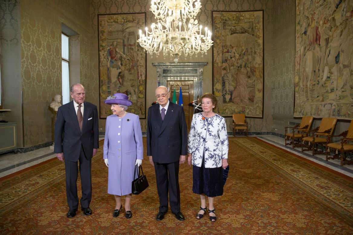 For her visit to Italy, the Queen was accompanied by her husband, Prince Phillip, left. They were greeted by Italian President Giorgio Napolitano and his wife, Clio, at the presidential palace in Rome.