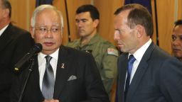 Malaysia Prime Minister Najib Razak (L) looks at Australian Prime Minister Tony Abbott at RAAF base Pearce on April 3, 2014 in Perth, Australia.