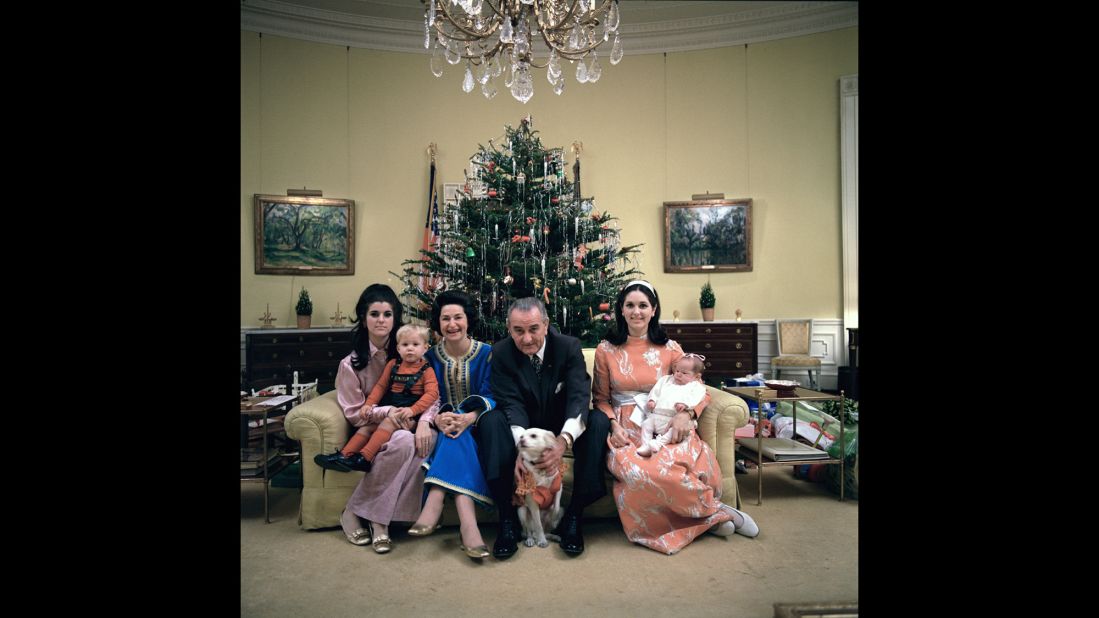 This 1968 Christmas photo shows President Lyndon B. Johnson posing with his family, his daughters grown and married, at the White House. With him, from left, daughter Luci Johnson Nugent holding Lyn Nugent; and wife Lady Bird Johnson. Sitting to his right; daughter Lynda Johnson Robb holding Lucinda Robb.  