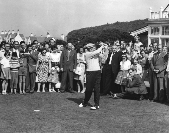 U.S. President Dwight D. Eisenhower drives down the fairway at Turnberry in Scotland in 1959. Eisenhower, a friend of Palmer's, was a golfing fanatic who <a href="index.php?page=&url=http%3A%2F%2Fwww.whitehousemuseum.org%2Fwest-wing%2Foval-office-history.htm" target="_blank" target="_blank">destroyed the floor of the White House's Oval Office</a> with his golf spikes. 
