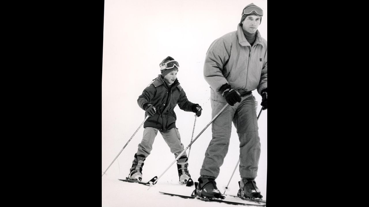 Capt. Mark Phillips, then-husband of Princess Anne, skies with his son, Peter, in Morzine, France, in January 1986.