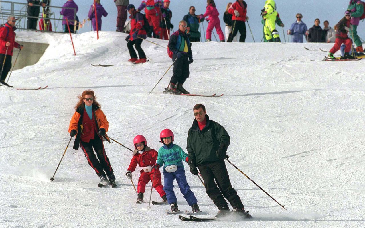 Prince Andrew, the Duke of York, and his then-wife Sarah, the Duchess of York, ski with their daughters, Beatrice and Eugenie, in Verbier, Switzerland, in February 1997.