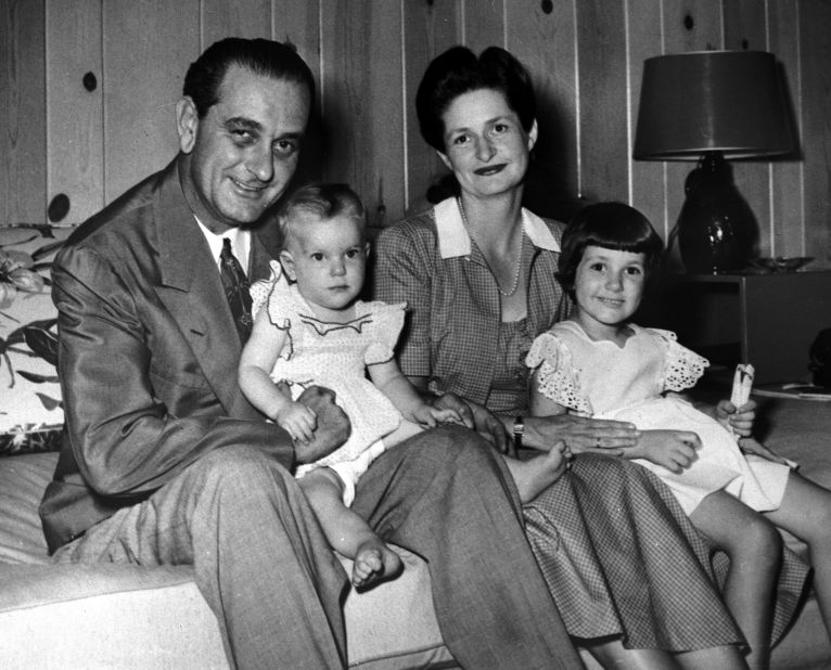 Lyndon B. Johnson poses for a family portrait with his wife Lady Bird and daughters on August 25, 1948. He holds Luci Baines on his lap and his wife holds Lynda Bird, who was 4 years old. 