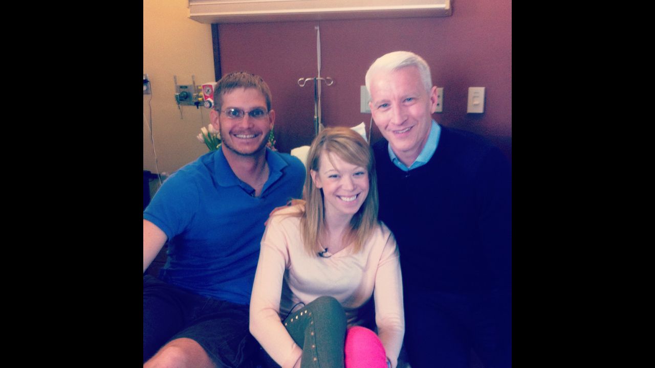 CNN's Anderson Cooper with Adrianne Haslet-Davis and her husband Adam Davis a week after the bombings.