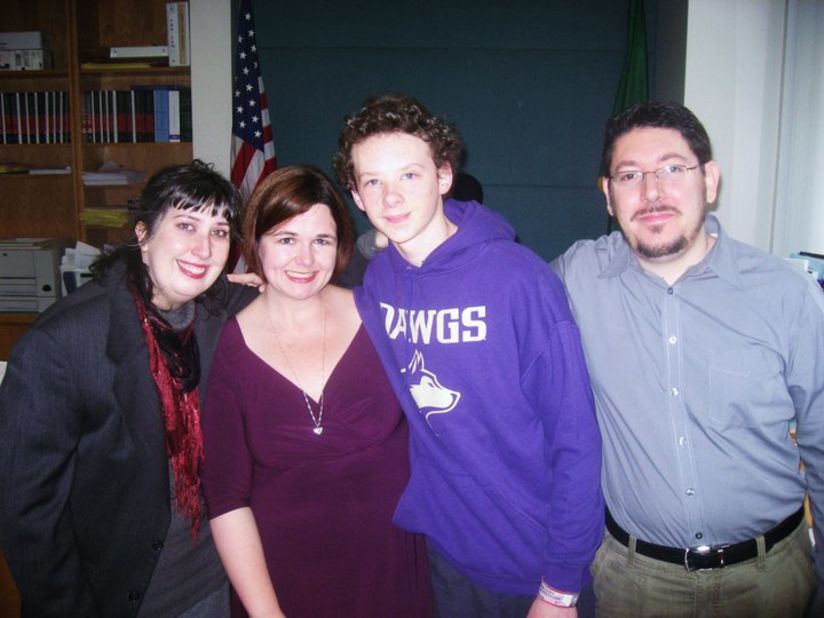 Stanton, second from left, the day the adoption of her son David, middle right, became official in 2010. 