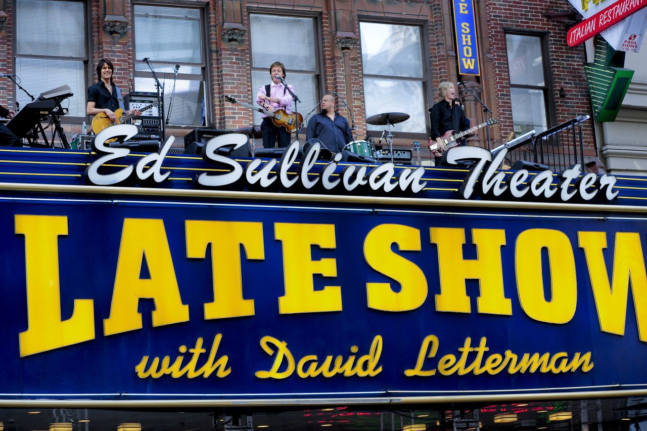 Musician Paul McCartney took over the marquee of the Ed Sullivan Theater, where the Beatles made big news in 1964, to performs for the '"Late Show" on July 15, 2009.