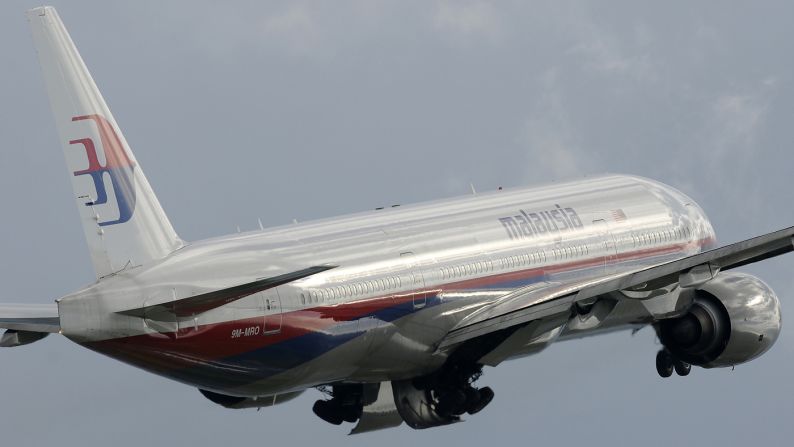 Lorenzo Giacobbo captured the now-missing Malaysia Airlines jet -- registration No. 9M-MRO -- flying into cloudy skies above Rome on January 30, 2011.
