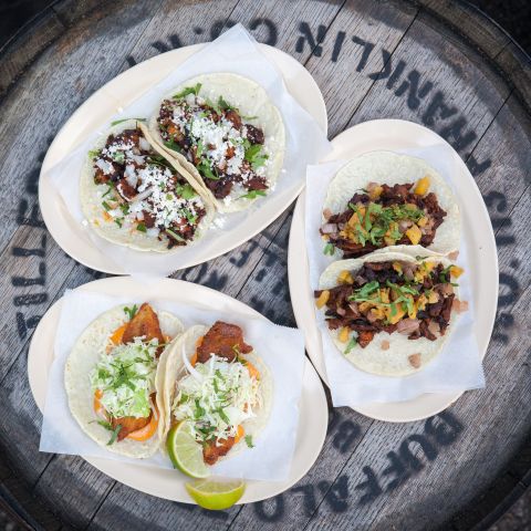 Whether they're filled with al pastor, Peking duck, or a bone-in pork chop, America's best tacos aren't just for Tuesday. Here are 10 of the best.