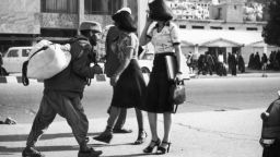 7th June 1978: Women in short skirts and high heels walking freely down a street in Kabul.