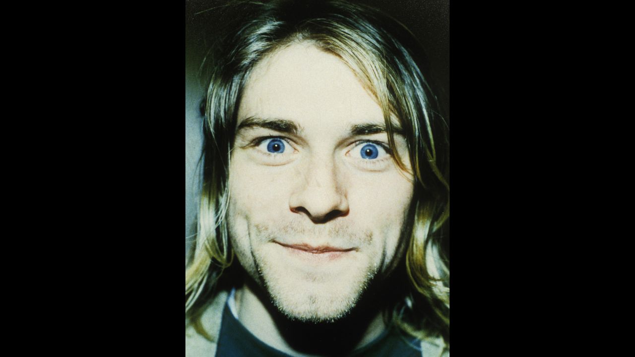 Cobain mugs for the camera in 1992.