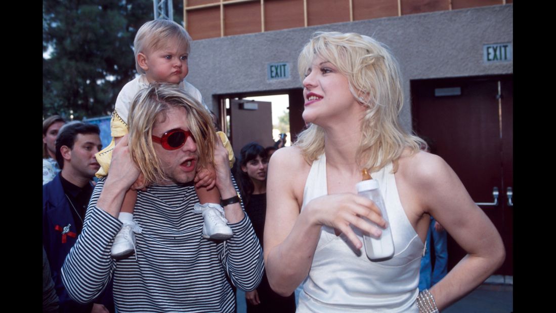 Cobain with his wife, Courtney Love, and their daughter, Frances Bean, backstage at the MTV Video Music Awards in 1993. 