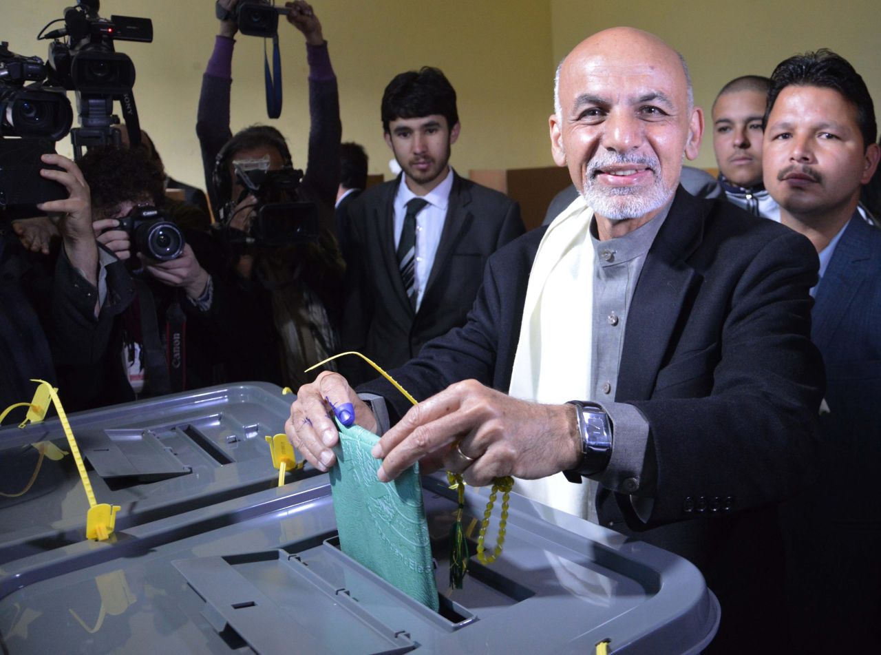 Presidential contender Ashraf Ghani casts his ballot at a polling station in Kabul. Ghani, who earned his doctorate at Columbia University, is from the Pashtun ethnic group. His running mate is Abdul Rashid Dostum, a leader of the Uzbek ethnic group.