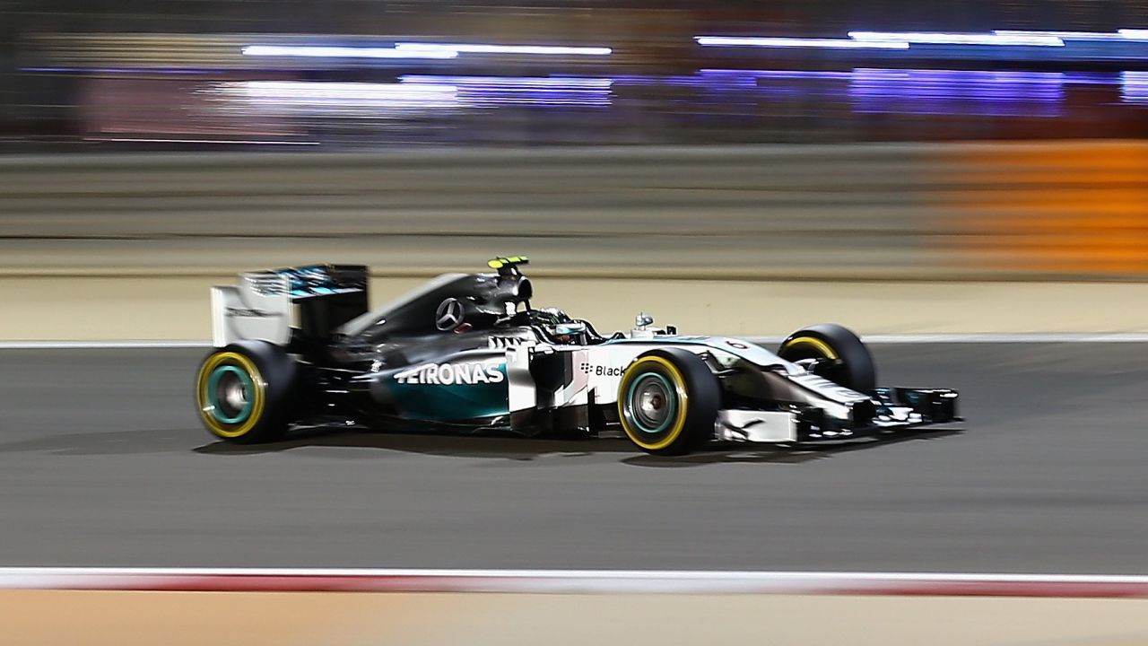 Mercedes AMG Petronas German driver Nico Rosberg steers his car ahead of Williams Martini finnish driver Valtteri Bottas on April 5, 2014, during the qualification session at the Bahrain International Circuit in Manama, ahead of the Bahrain Formula One Grand Prix. AFP PHOTO/MARWAN NAAMANI MARWAN NAAMANI/AFP/Getty Images