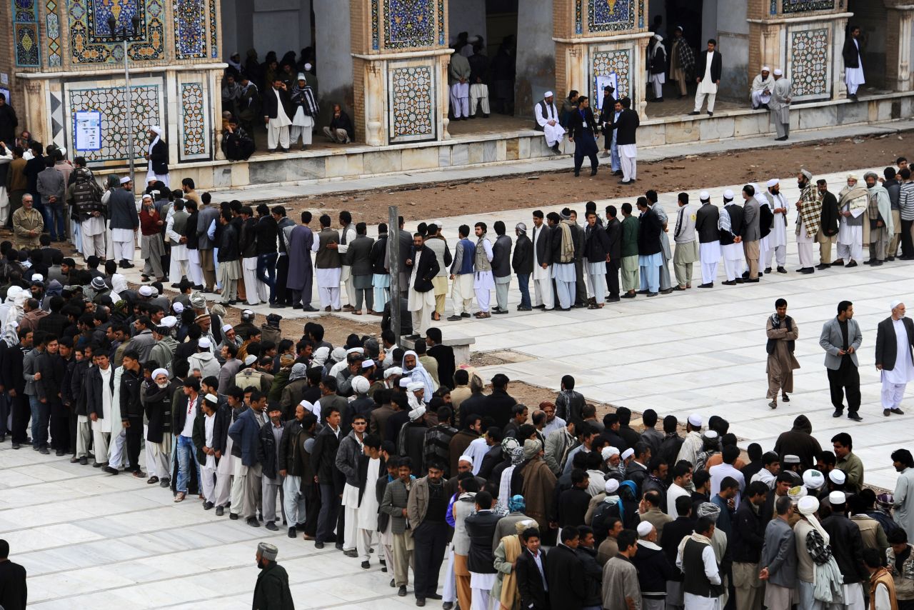 Afghans wait in long lines for their chance to cast a vote. 