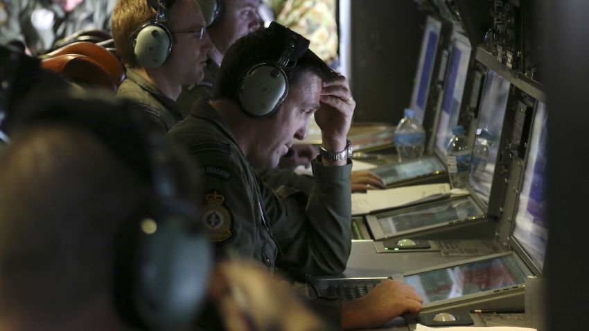 Operators monitor TAC stations onboard a RNZAF P3 Orion during search operations for wreckage and debris of missing Malaysia Airlines Flight MH370 in Southern Indian Ocean on April0 4, 2014, near Australia.  Up to fourteen planes and nine ships resumed in the search for missing Malaysia Airlines flight MH370 in the Indian Ocean off the coast of Western Australia today. The airliner disappeared on March 8 with 239 passengers and crew on board and is suspected to have crashed into the southern Indian Ocean.