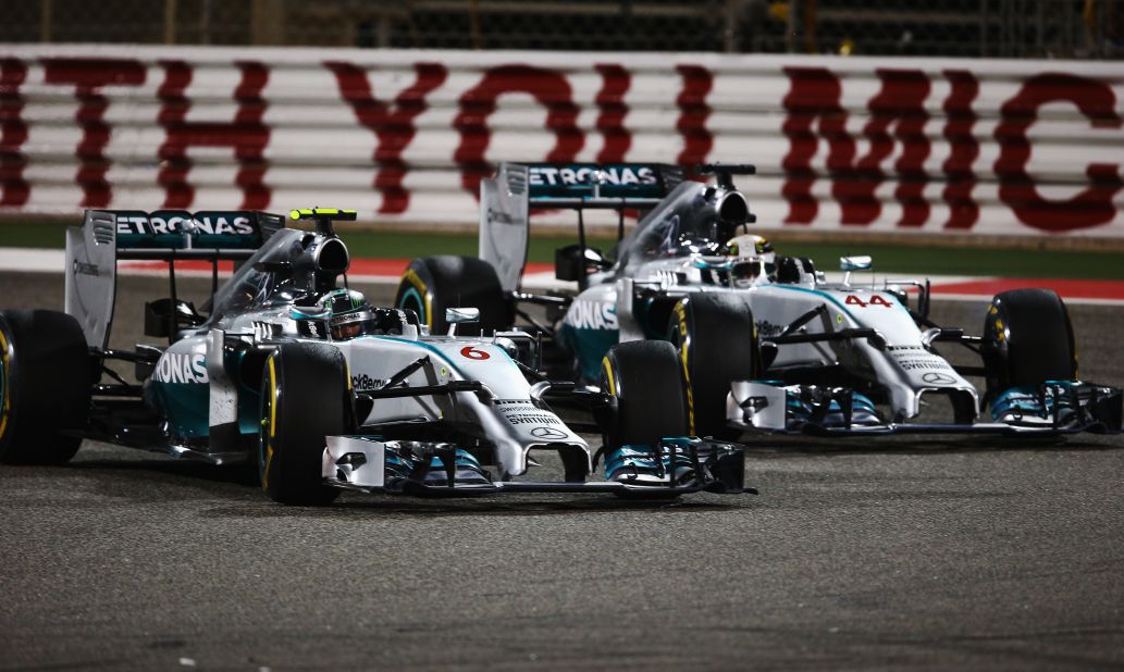 Nico Rosberg (left) and Mercedes teammate Lewis Hamilton battle for the lead during the Bahrain Grand Prix at the Bahrain International Circuit in Sakhir.