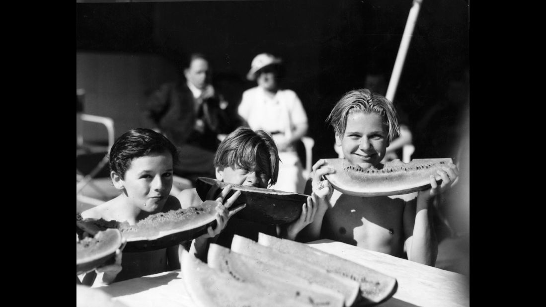 Rooney, center, is seen with fellow young Hollywood actors Jackie Cooper, right, and Freddie Bartholomew circa 1930.