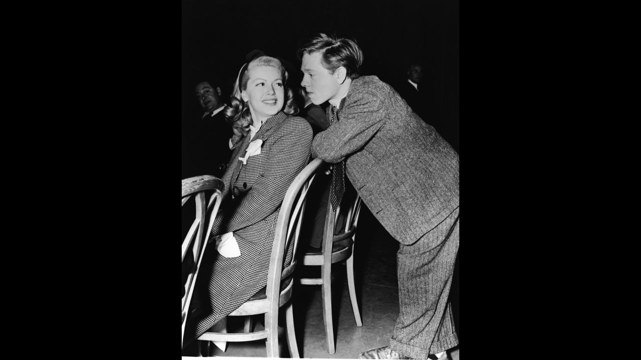 Rooney talks with Lana Turner in the late 1930s.